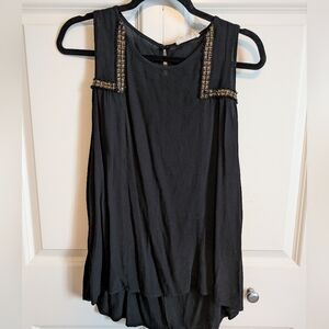 Elodie Black Tank with Gold Detailing feels like a light linen fabric
